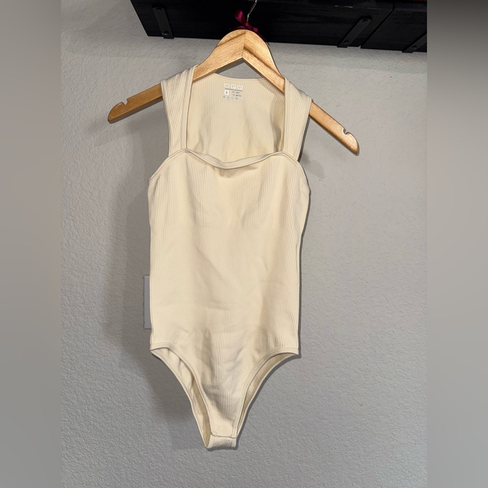 Elegant Cream Ribbed Bodysuit